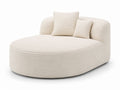 Owalna sofa sztruks kremowy z poduszkami